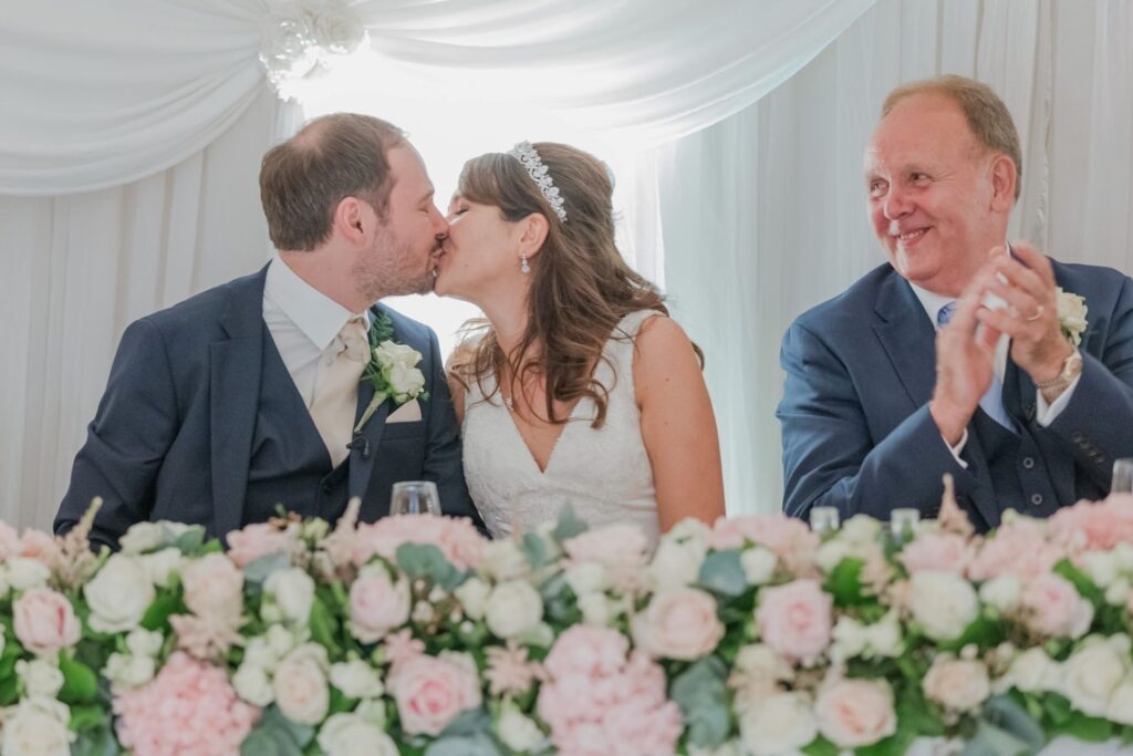 123 groom kisses bride kimpton fitzroy london hotel reception oxford wedding photography