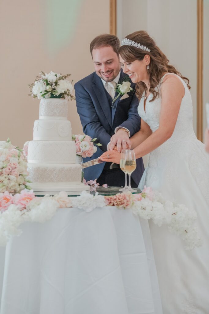 125 bride groom cut cake kimpton fitzroy london hotel oxfordshire wedding photographers
