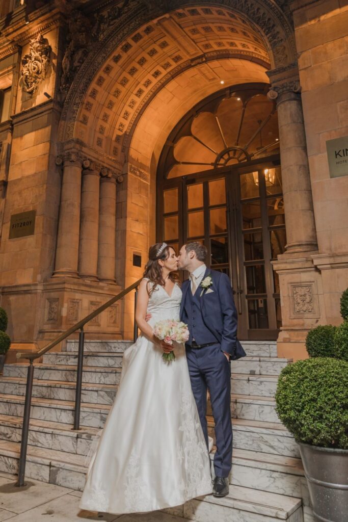 148 bride groom kiss outside kimpton fitzroy london hotel oxfordshire wedding photographer