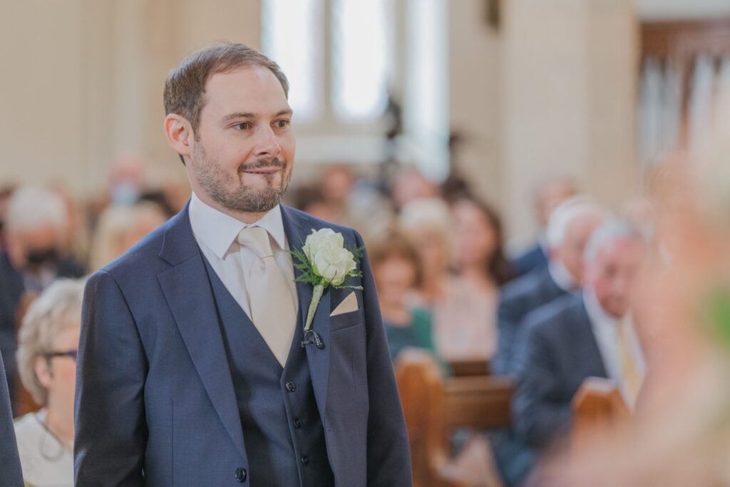 31 groom awaits bride st peter in chains church alter north london oxfordshire wedding photography