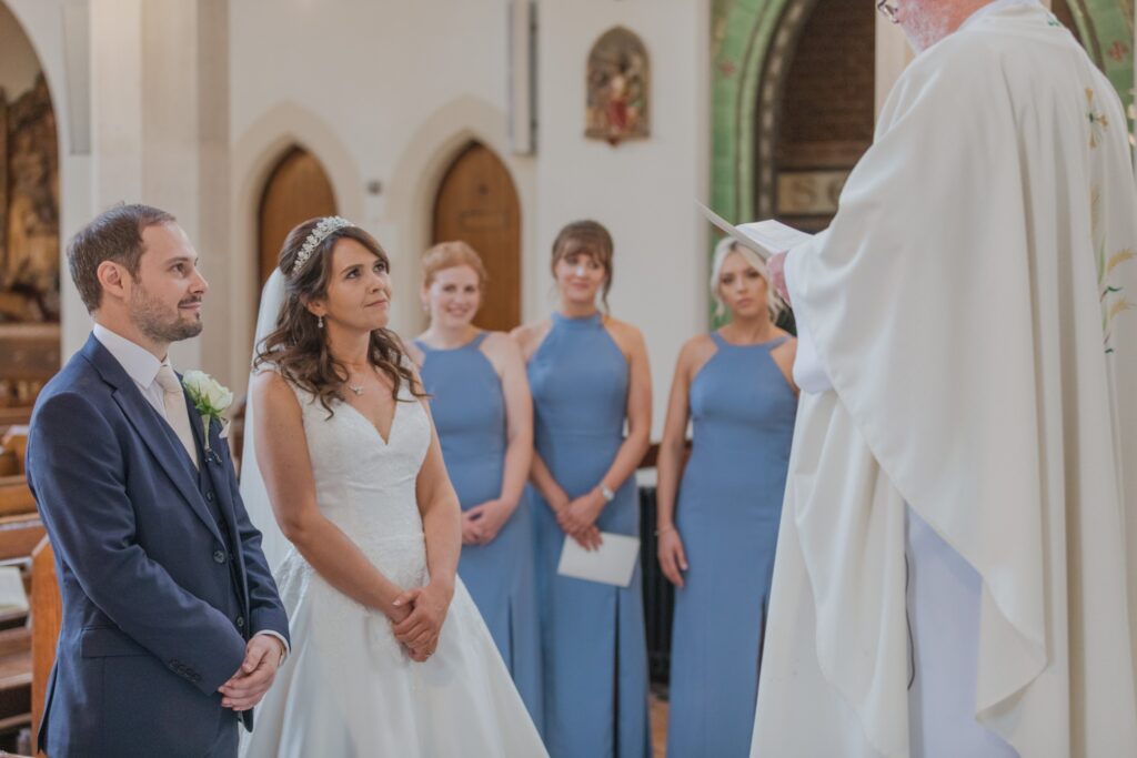 43 bride groom bridesmaids hear st peter in chains priest north london oxfordshire wedding photography