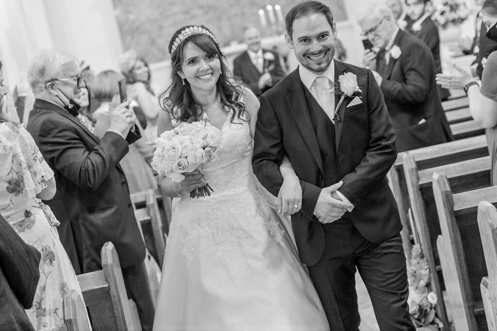 58 smiling bride grooms aisle walk st peter in chains marriage ceremony london oxfordshire wedding photographer