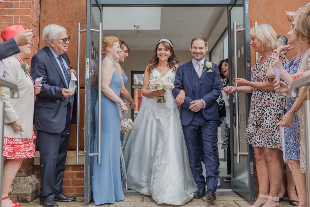 61 bride groom exit st peter in chains church north london oxford wedding photographers