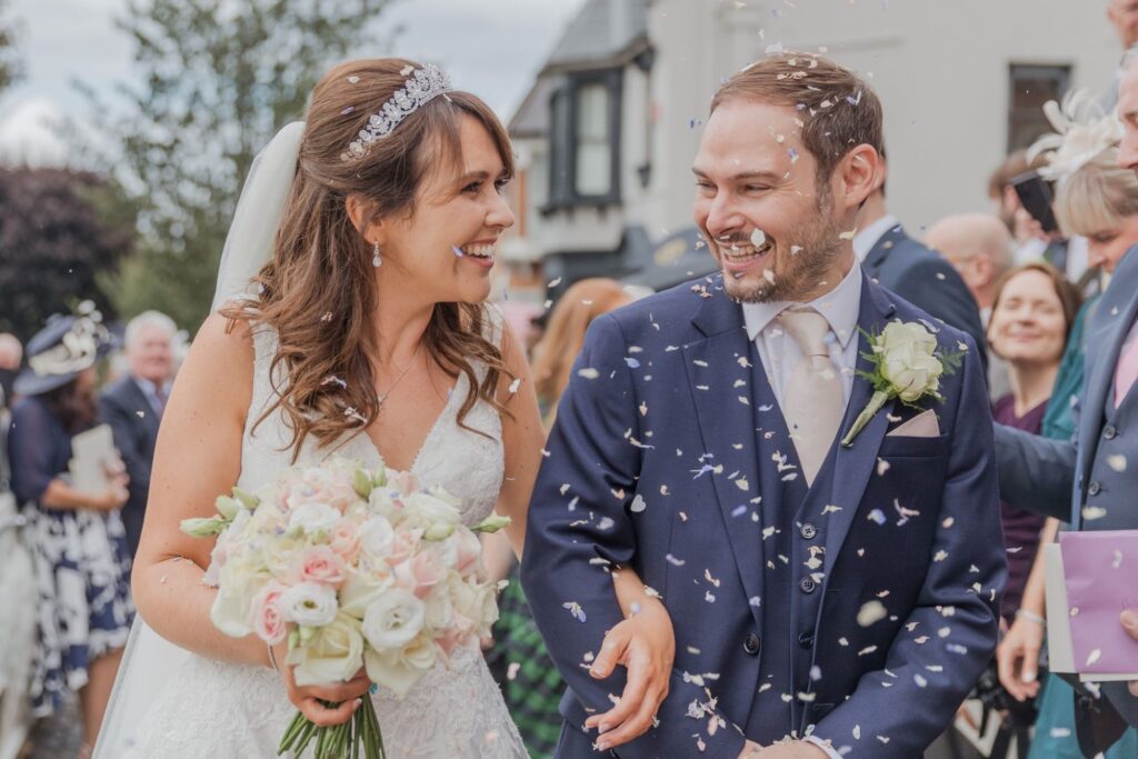 64 guests throw confetti peter in chains church north london oxfordshire wedding photographers
