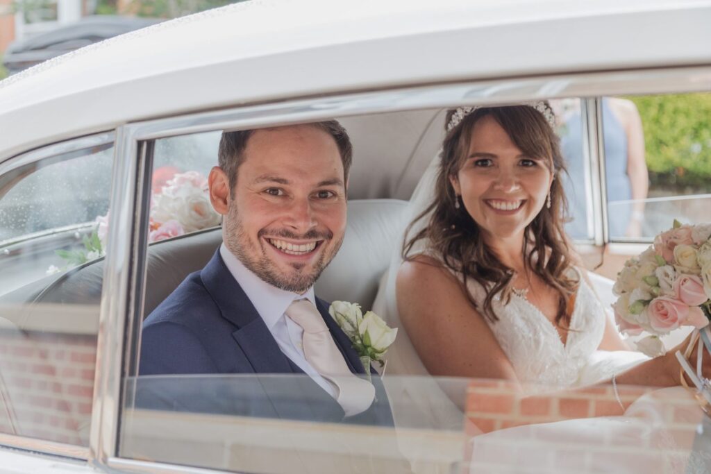 69 smiling bride groom bridal car st peter in chains church north london oxfordshire wedding photographer