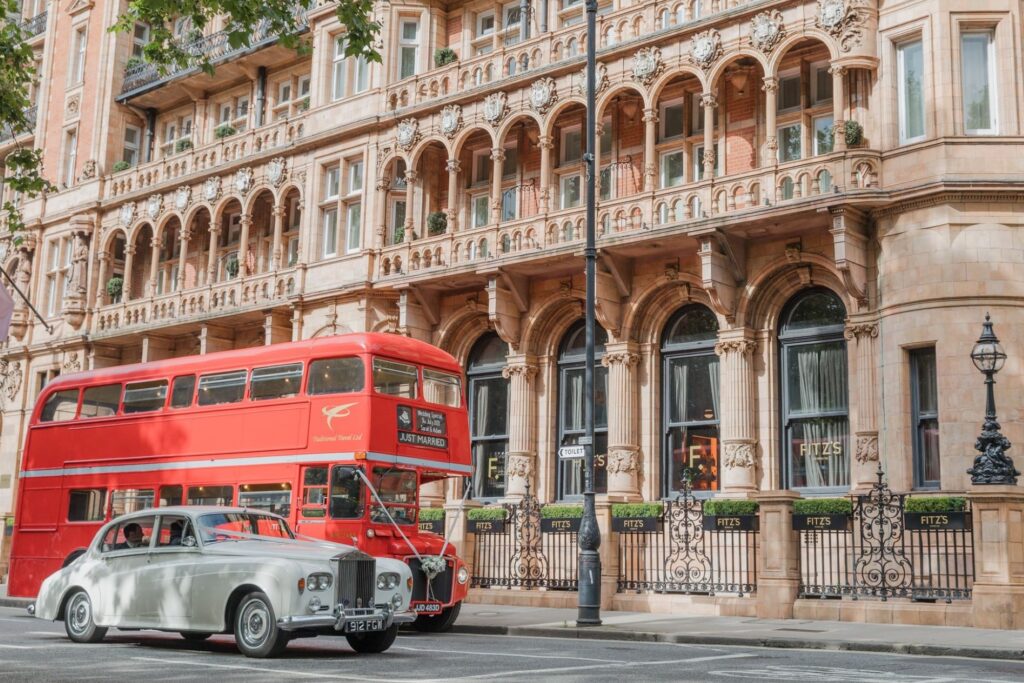 73 bride grooms bridal car guests red double decker bus russell square london oxford wedding photographers