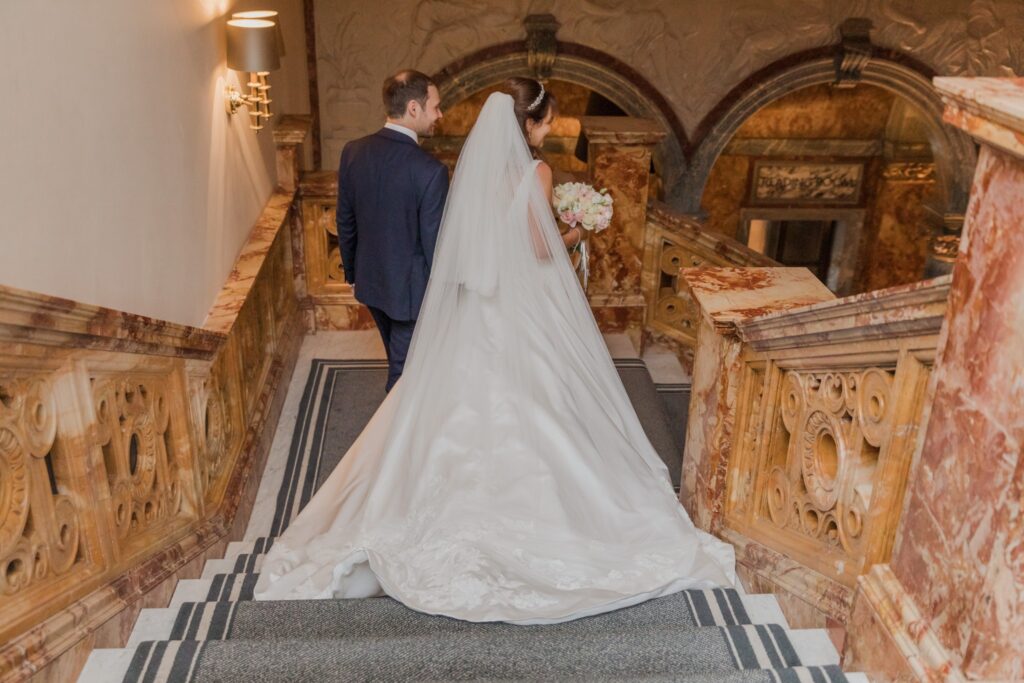 97 bride groom descend marble staircase kimpton fitzroy london hotel oxfordshire wedding photographer