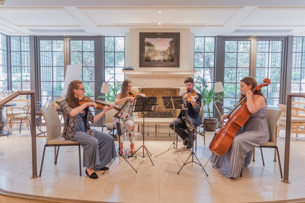 99 string quartet kimpton fitzroy london hotel reception oxfordshire wedding photography