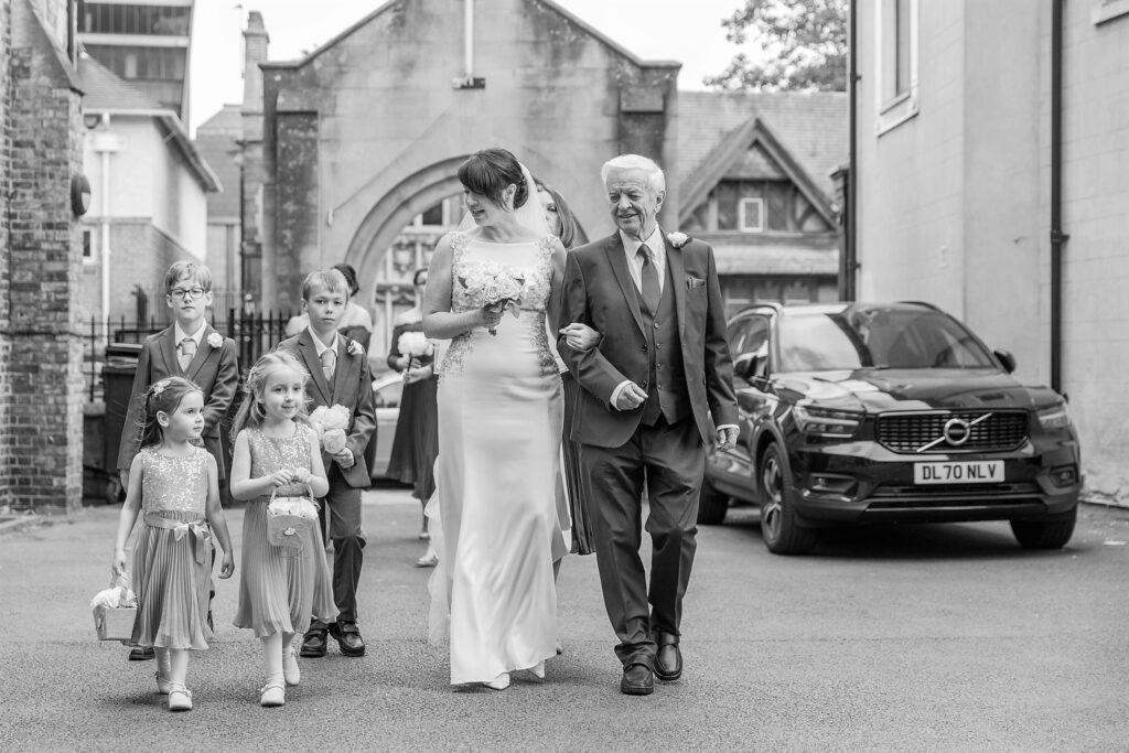31 father escorts bride oxford oratory wedding s r urwin photographer oxfordshire