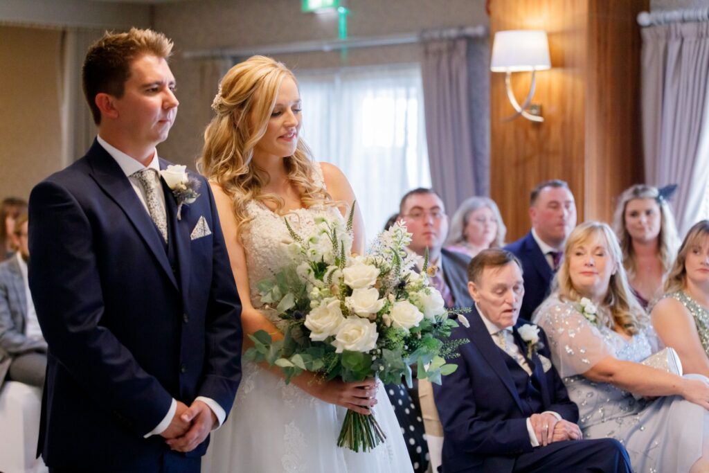 40 bride holds bouquet horsley lodge hotel wedding ceremony derby s r urwin photography oxfordshire