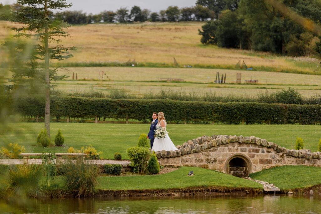 56 bride groom cross stone bridge horsley lodge golf club derbyshire oxfordshire wedding photographers