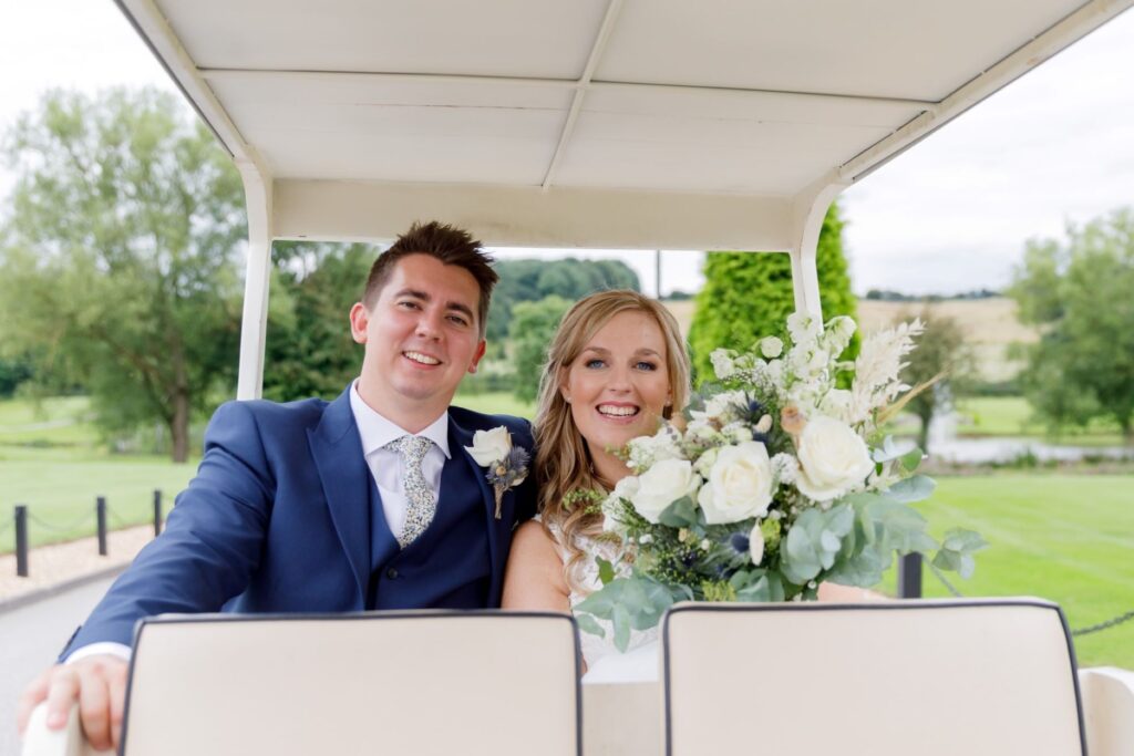 58 smiling bride grooms golf buggy ride horsley lodge hotel derbyshire oxford wedding photographer