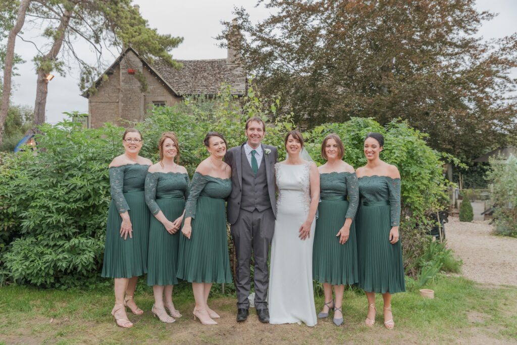 78 smiling bride groom bridesmaids ye olde swan wedding barn radcot s r urwin photography oxfordshire