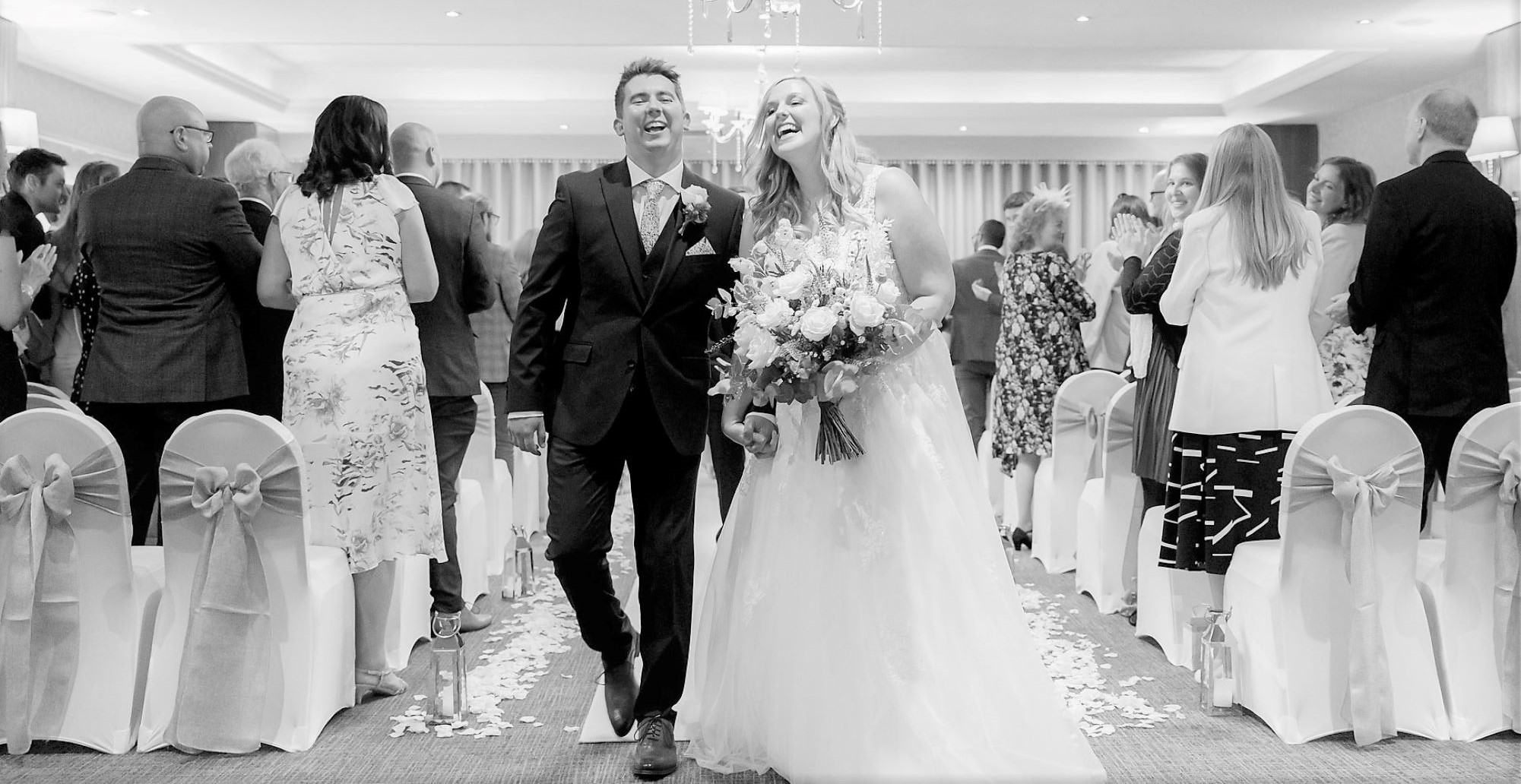 laughing bride grooms aisle walk horsley lodge hotel wedding ceremony derby s r urwin photography oxfordshire