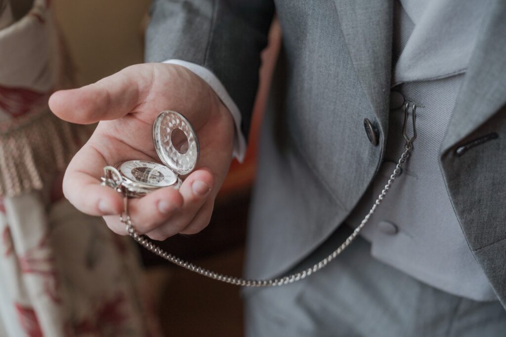34 groom checks pocket watch rowton castle shropshire oxford wedding photographers