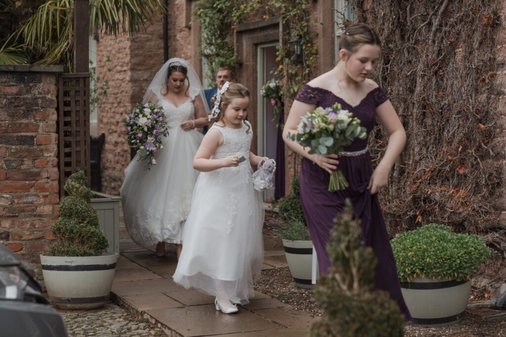 43 brides party walk towards ceremony shrewbury venue oxfordshire wedding photographer