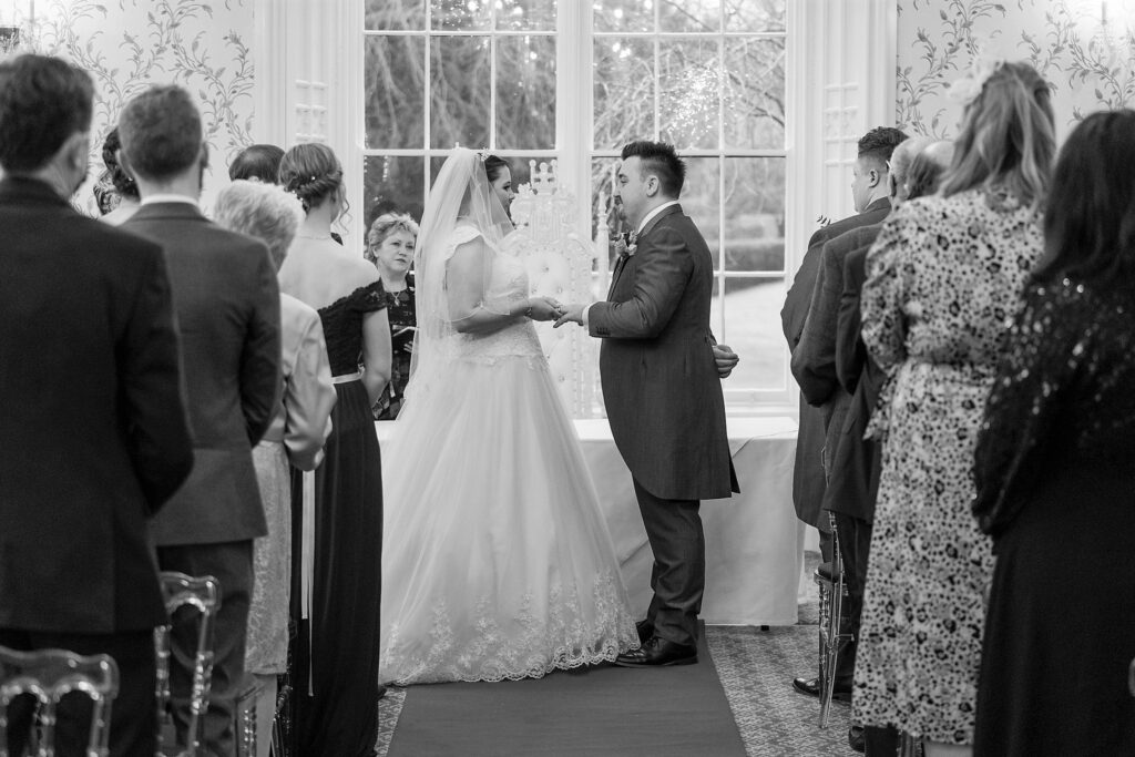 74 celbrant hears bride groom exchange vows shrewsbury ceremony oxford wedding photographers