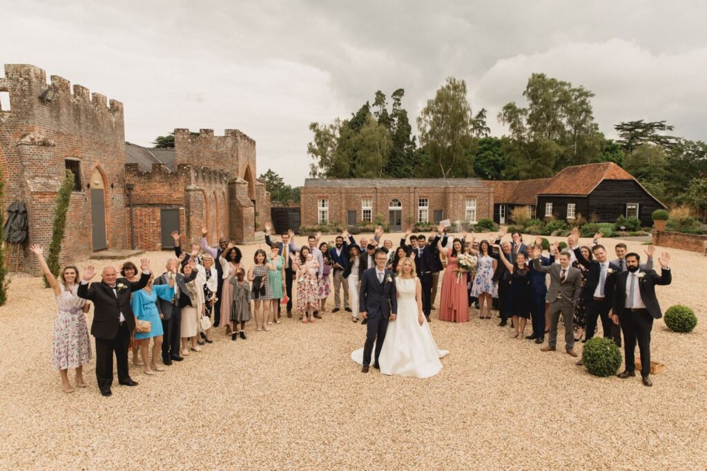 49 bride groom waving guests portrait berkshire wedding s r urwin oxford photographers