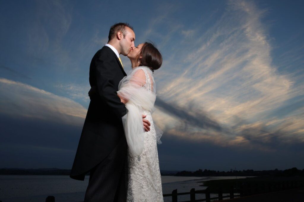 09 bride grooms twilight kiss s r urwin wedding photographers oxford
