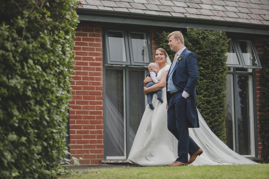 102 bride carries baby groom escorts thorganby venue gardens north yorkshire oxford wedding photographer