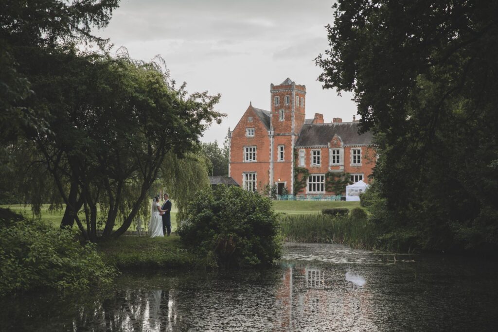 108 bride groom under willow tree thorganby venue gardens north yorkshire oxford wedding photographer