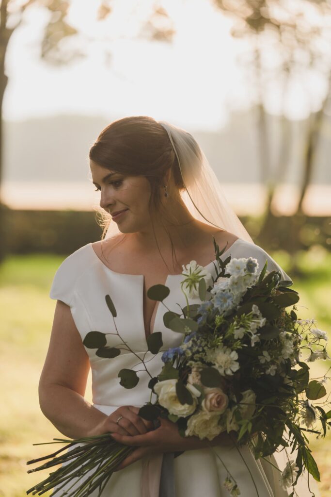 109 bride holds bouquet thorganby venue grounds north yorkshire oxford wedding photographers