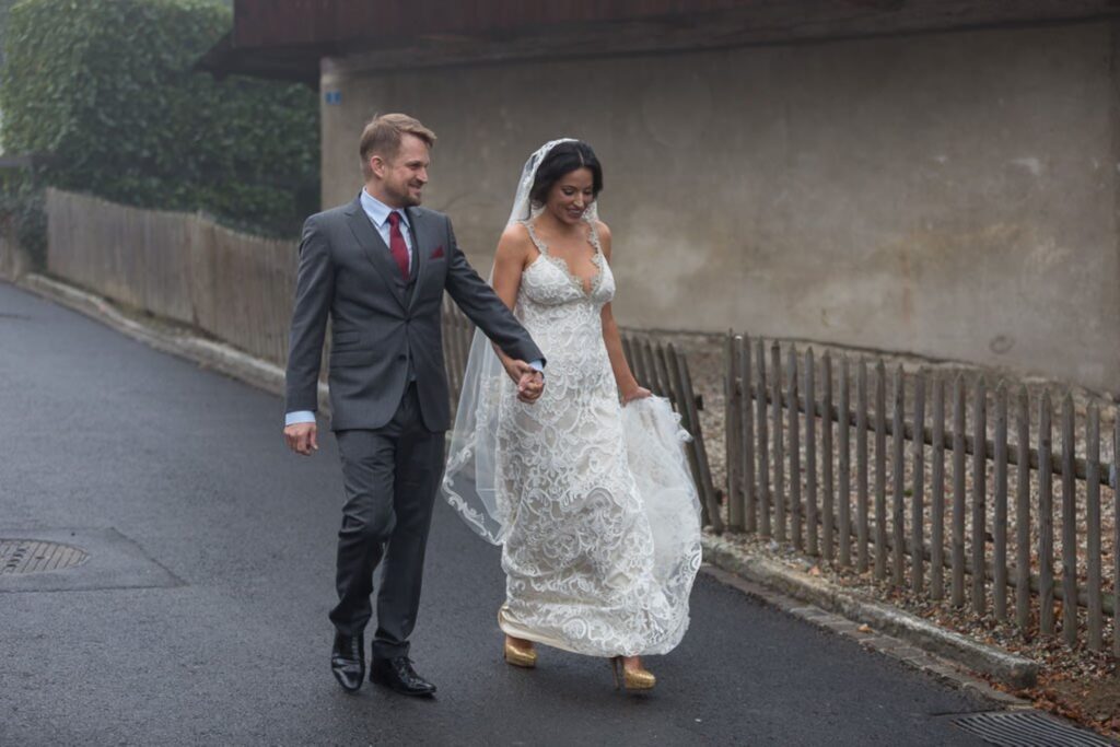 15 bride groom walk holding hands switzerland oxford destination wedding photography