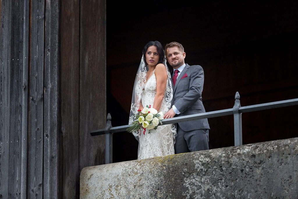 18 bride grooms balcony portrait switzerland oxfordshire destination wedding photographty