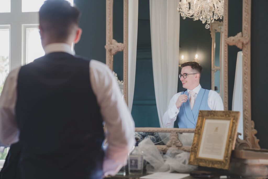 42 groomsmans mirror reflection groom prep thorganby venue north yorkshire oxford wedding photographer