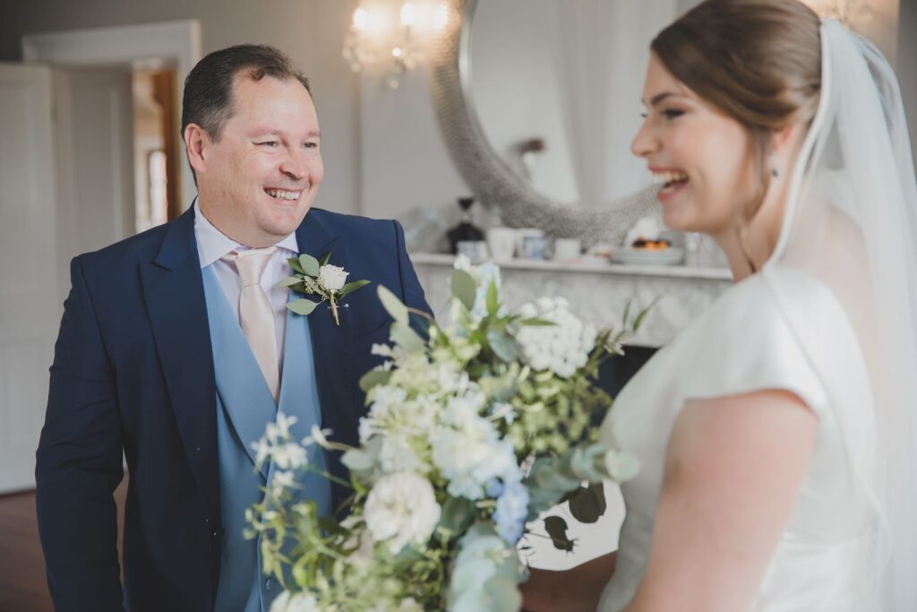 60 laughing bride meets father thorganby venue north yorkshire oxfordshire wedding photographer