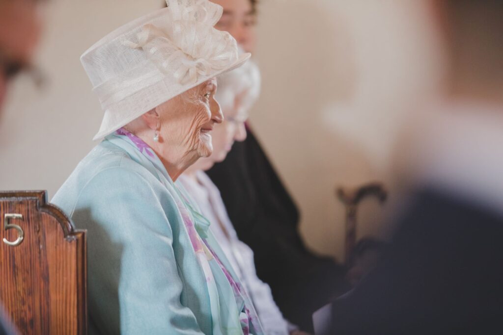 73 smiling elderly guest thorganby marriage ceremony thorganby venue north yorkshire oxfordshire wedding photographers