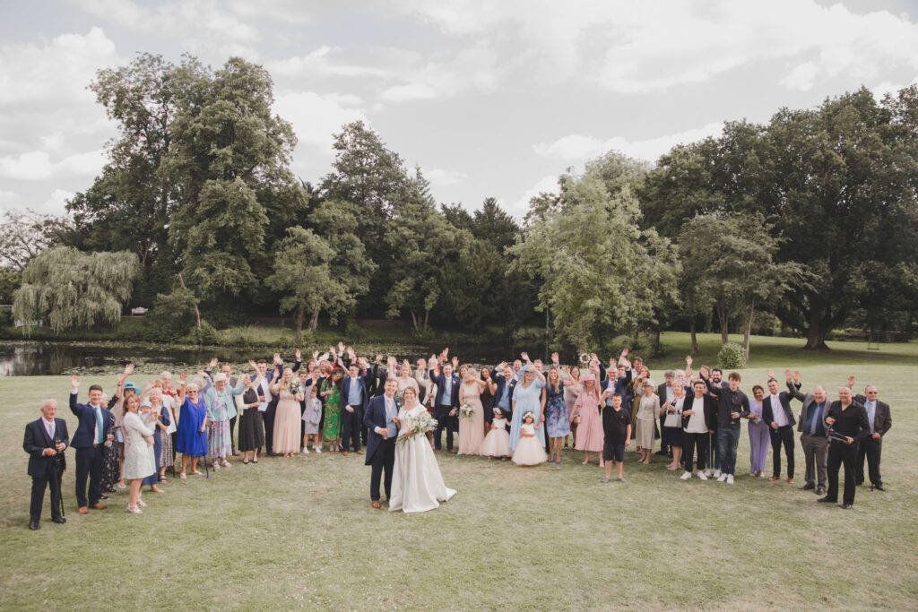 88 waving bride groom guests thorganby venue north yorkshire oxfordshire wedding photographers
