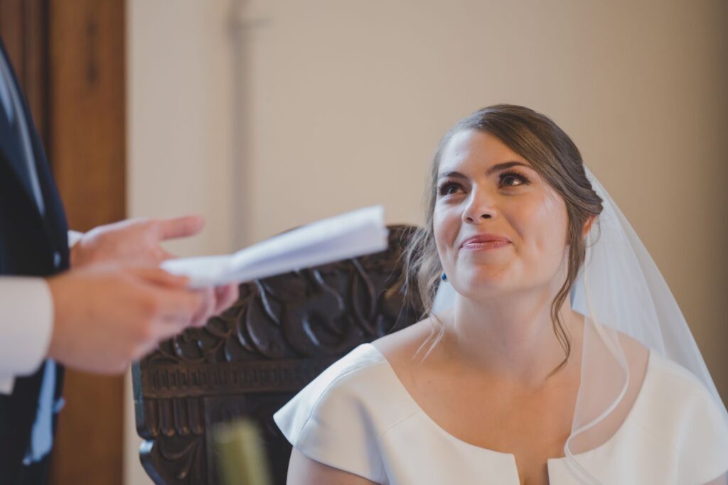93 smiling bride hears grooms speech thorganby north yorkshire oxfordshire wedding photographer