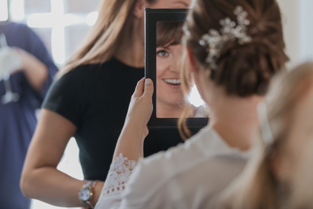08 brides mirror reflection bridal prep hunton park hotel hertfordshire oxford wedding photographers