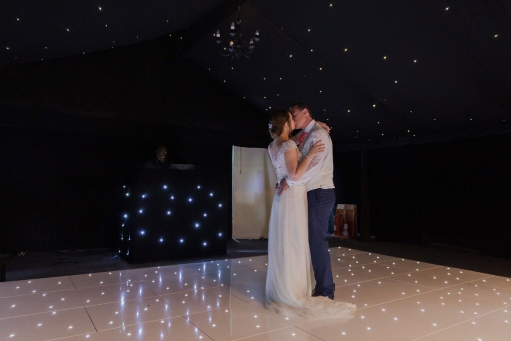 105 bride groom kiss first dance kings langley hotel watford oxford wedding photography