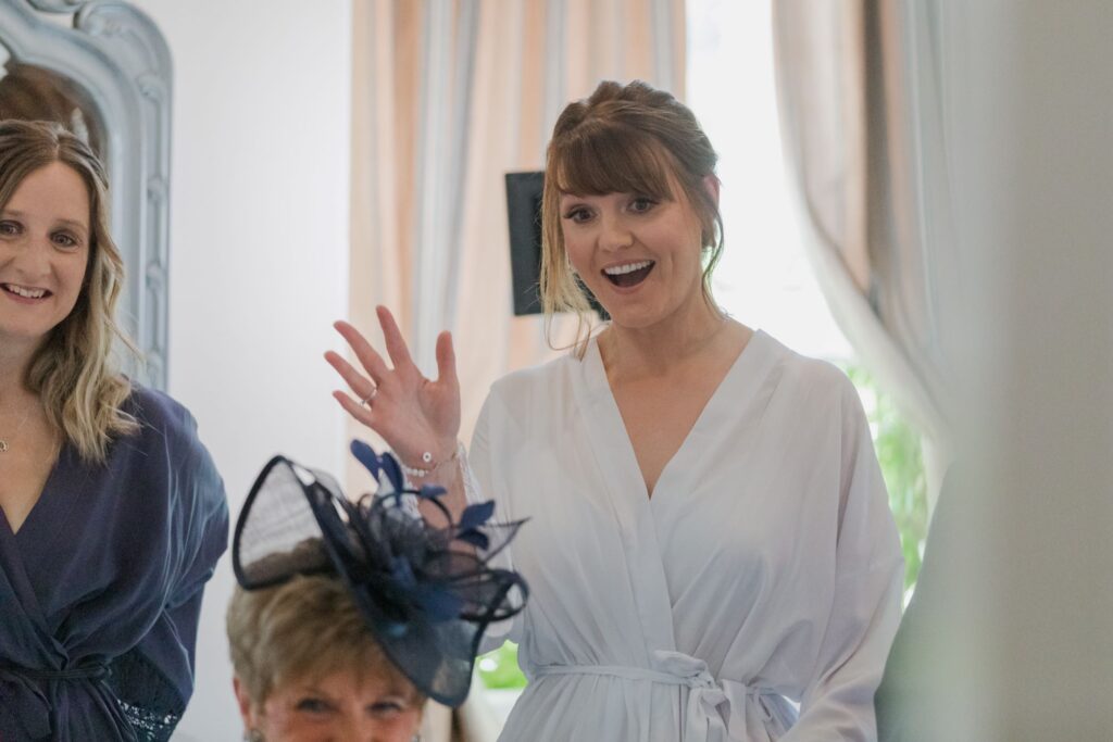 16 waving bridesmaid bridal preparation hunton park hotel hertfordshire oxfordshire wedding photographer