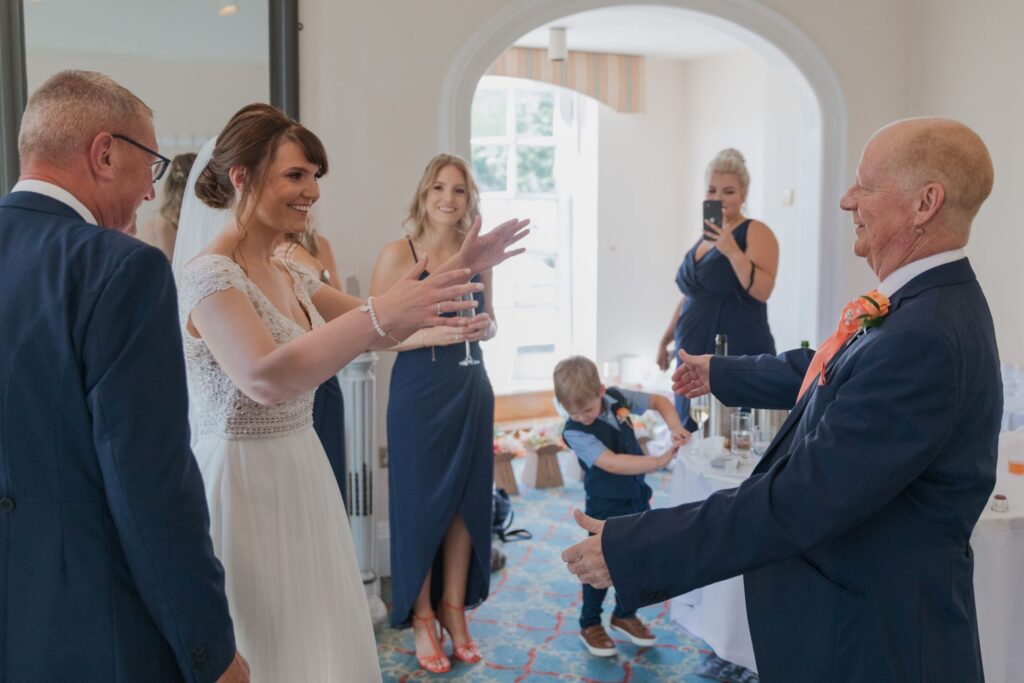 29 happy bride meets groomsmen hunton park hotel hertfordshire oxfordshire wedding photographers