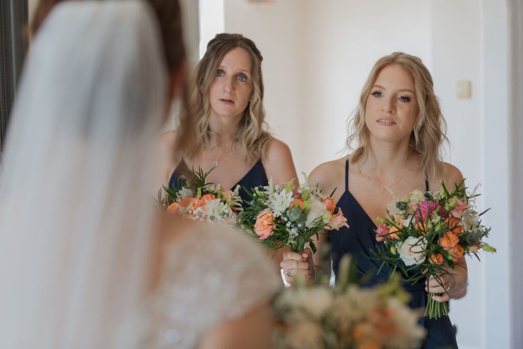34 bridesmaids hold bouquets kings langley watford oxfordshire wedding photographer