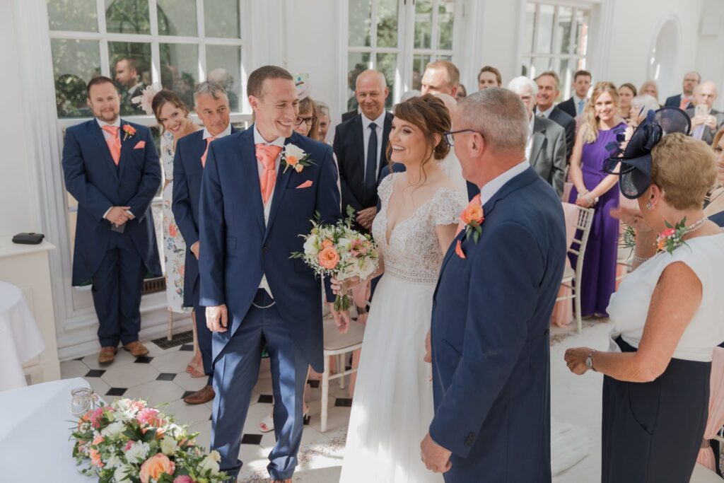 46 smiling groom meets bride kings langley marriage ceremony oxfordshire wedding photographer