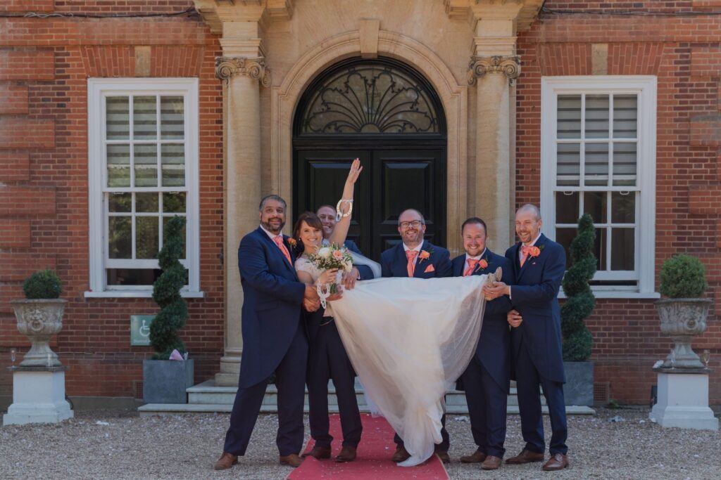 74 groomsmen lift bride kings langely watford oxford wedding photographers