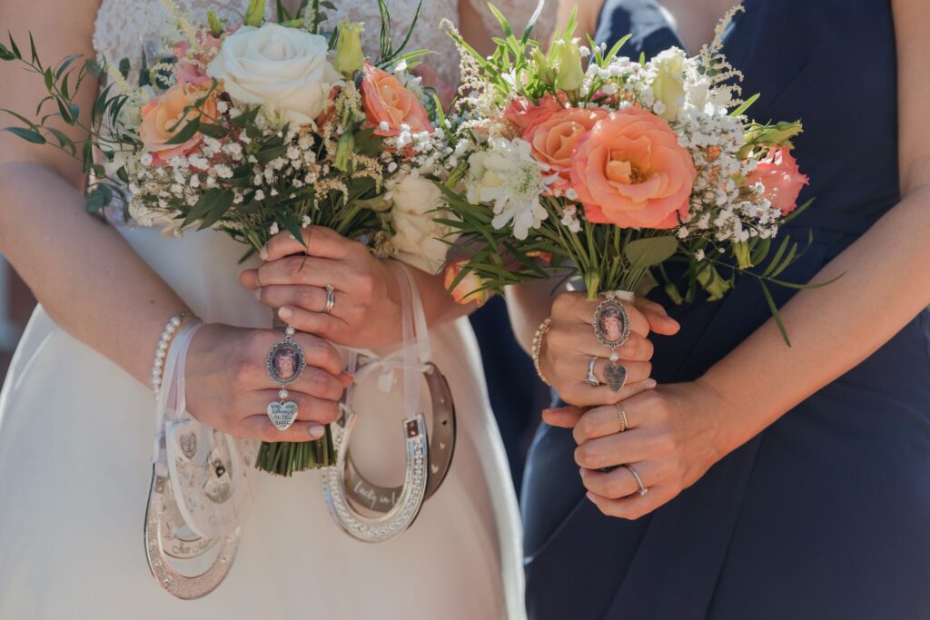 77 bride bridesmaid hold bouquets kings langley watford oxfordshire wedding photographers