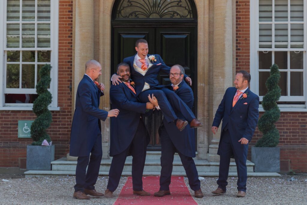 78 groomsmen lift groom kings langley watford oxfordshire wedding photography