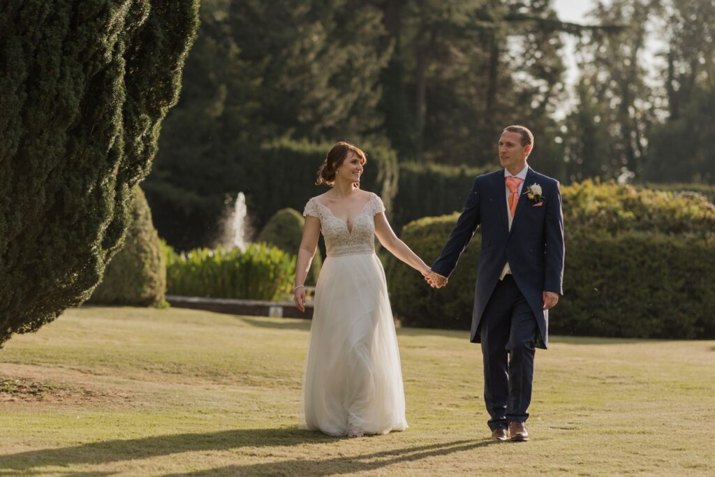 98 bride groom stroll kings langley hotel gardens hertfordshire oxford wedding photographers
