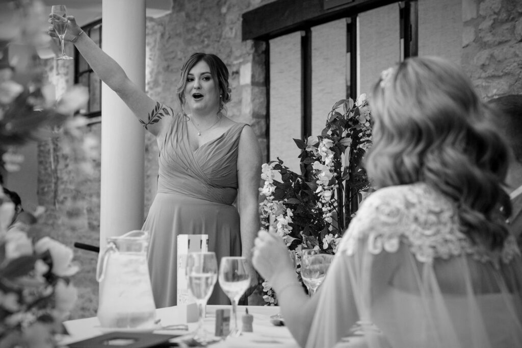 116 maid of honour proposes toast ihg hotel reception sandford oxford oxfordshire wedding photographer