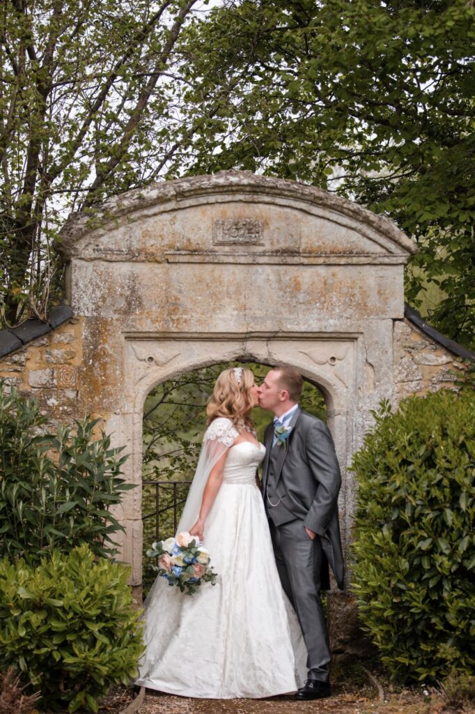 124 groom kisses bride ihg hotel sandford oxford oxfordshire wedding photography
