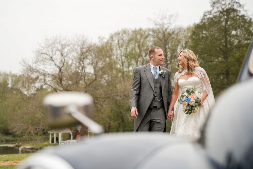 132 bride groom walk past vintage car igh hotel grounds sandford oxford oxfordshire wedding photographer