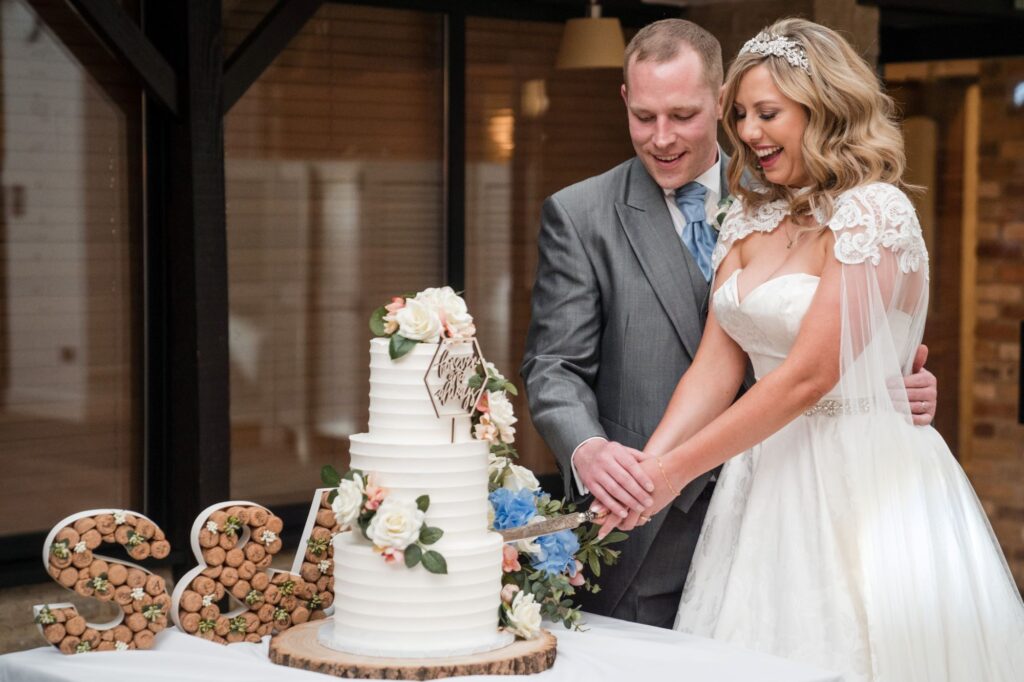 134 bride groom cut cake ihg hotel reception sandford oxford oxfordshire wedding photography