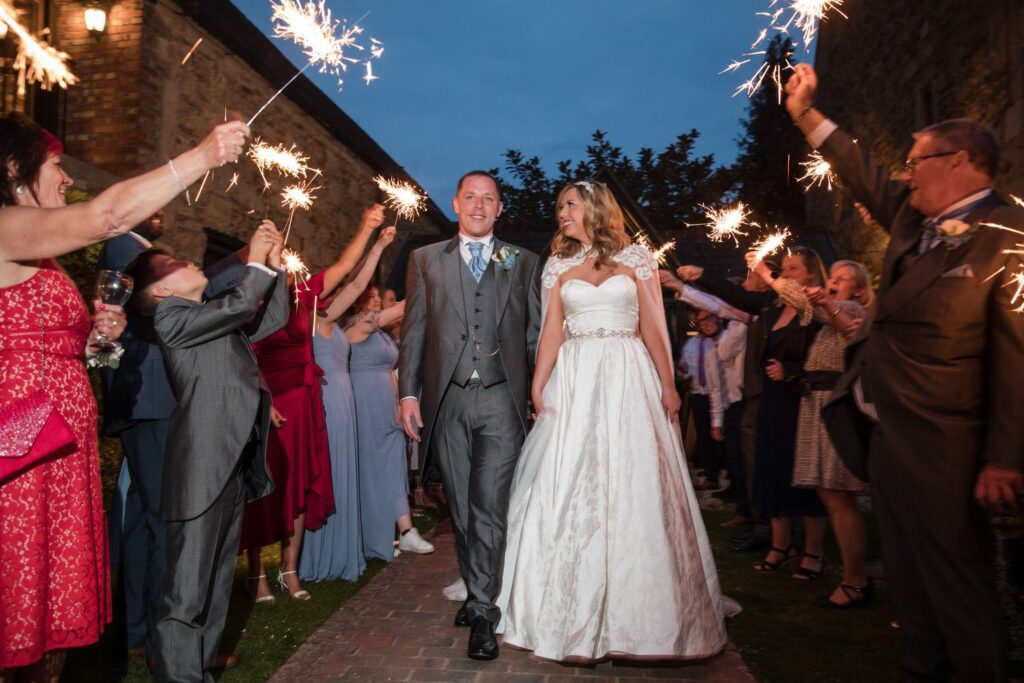 141 happy guests wave sparklers ihg hotel sandford oxford oxfordshire wedding photography