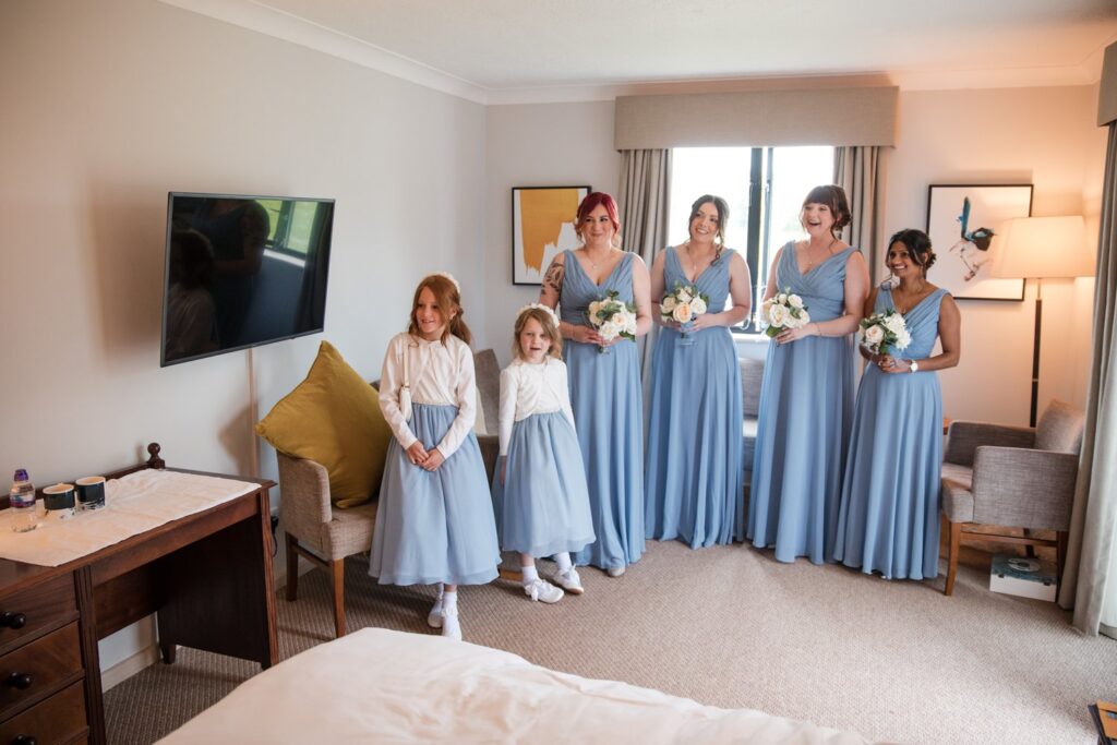 43 bridesmaids first look brides gown ihg hotel bridal prep sandford oxford oxfordshire wedding photographer