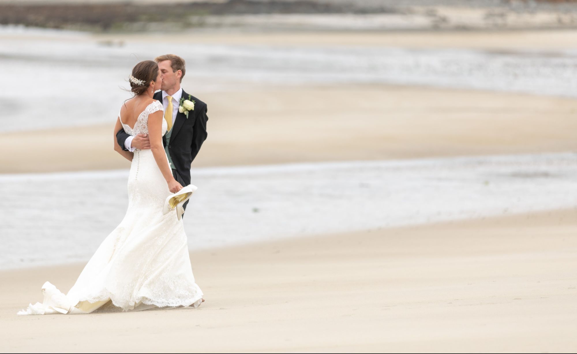 bride grooms beach kiss alderney channel islands oxfordshire destination wedding photographers